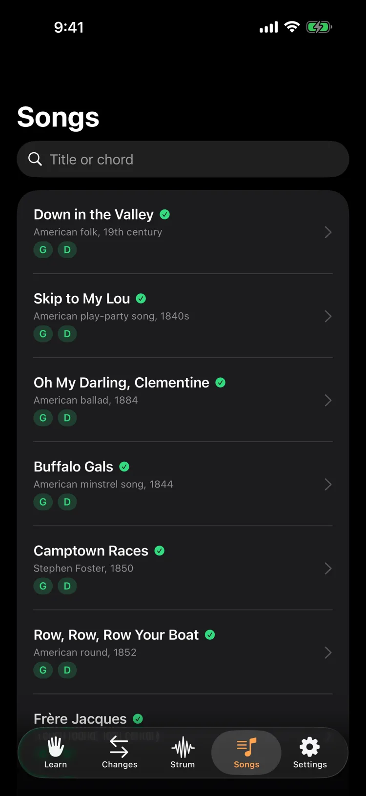 The song list with chord badges and checks for songs you can already play